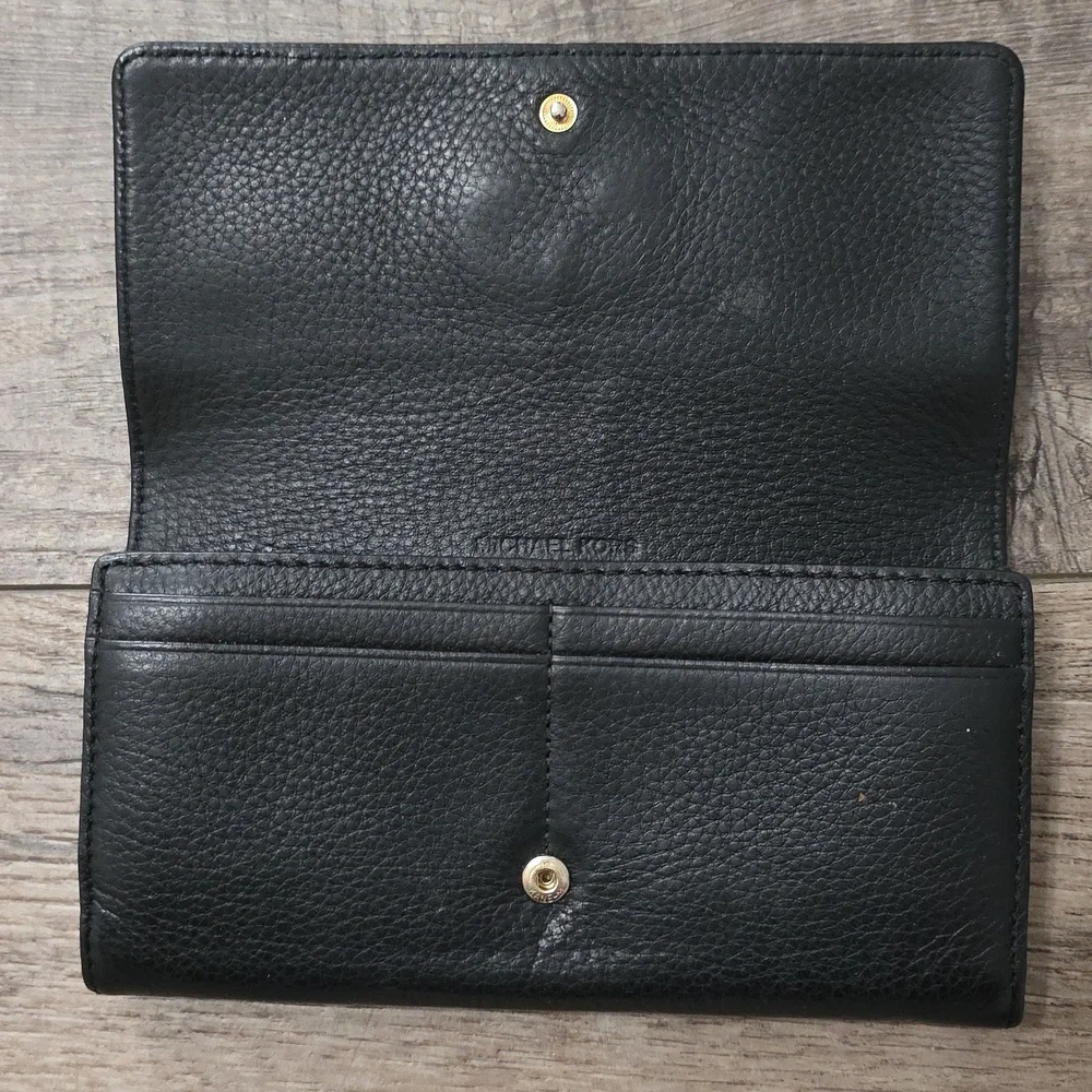 Michael Kors Fulton Large Flap Continental Wallet in black pebbled leather